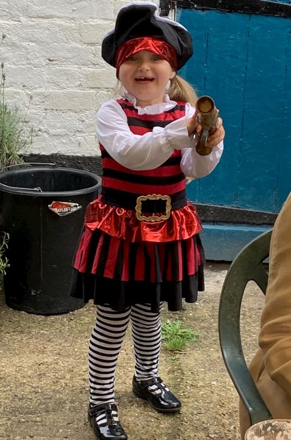 Wee girl dressed as a pirate