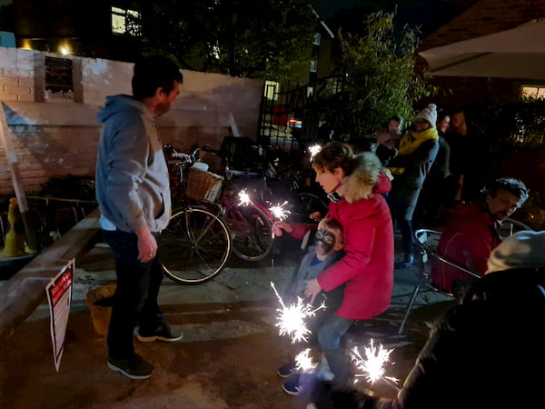 Kids were playine with sparklers (and supervised)