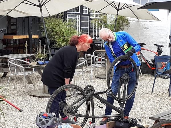 Repair going on at the Bike Kitchen in The Courtyard