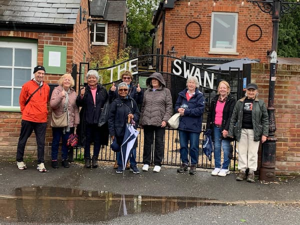 The walking team outside The Swan for a photo