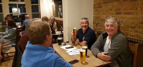 Team enjoying the quiz and cheap lager