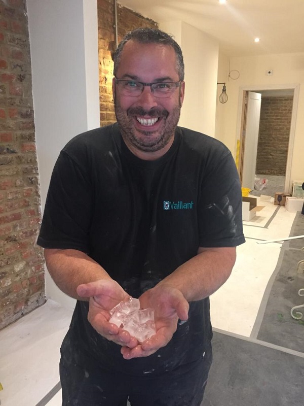 Scott the Plumber with ice from the newly commissioned machine