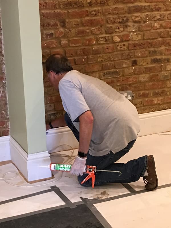 Painting the skirting 