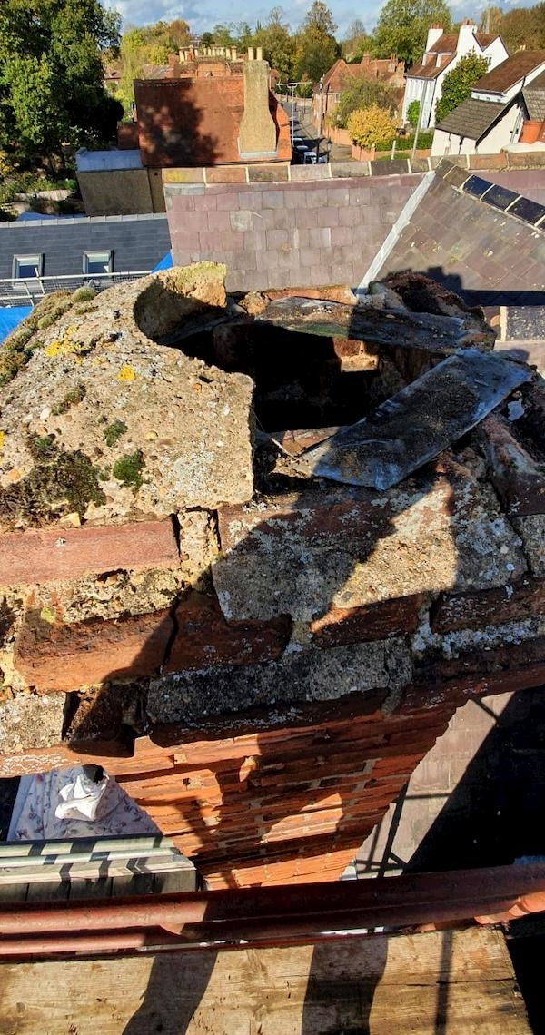 Obvous signs of damage on the top of a chimney stack