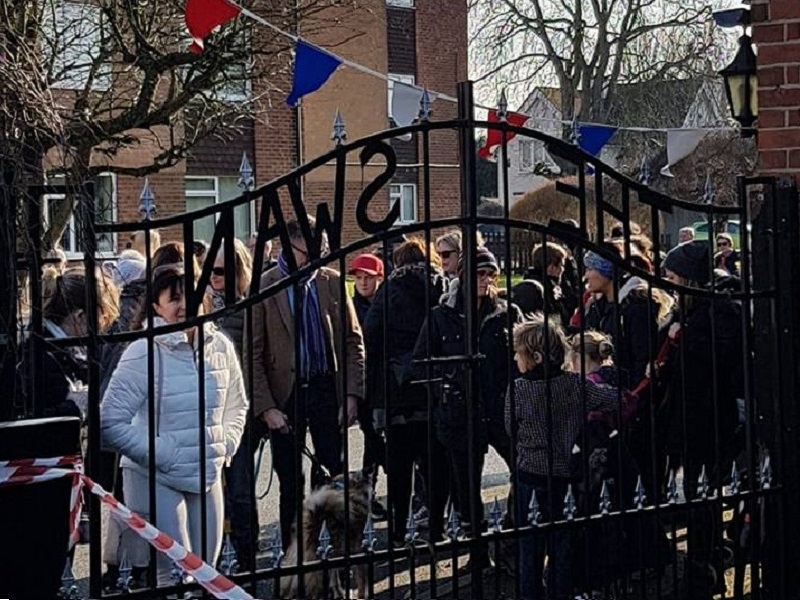 Supporters waiing for the gates to be opened