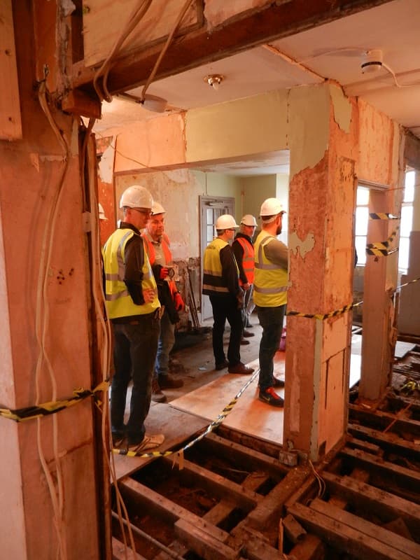 Work teams being formed in the main bar