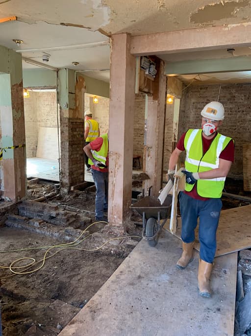 Removing rubble from the bar area