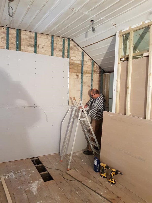 Plasterboarding the school room