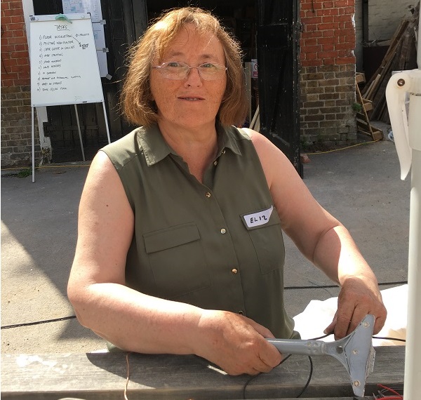 Liz wire stripping in the sun