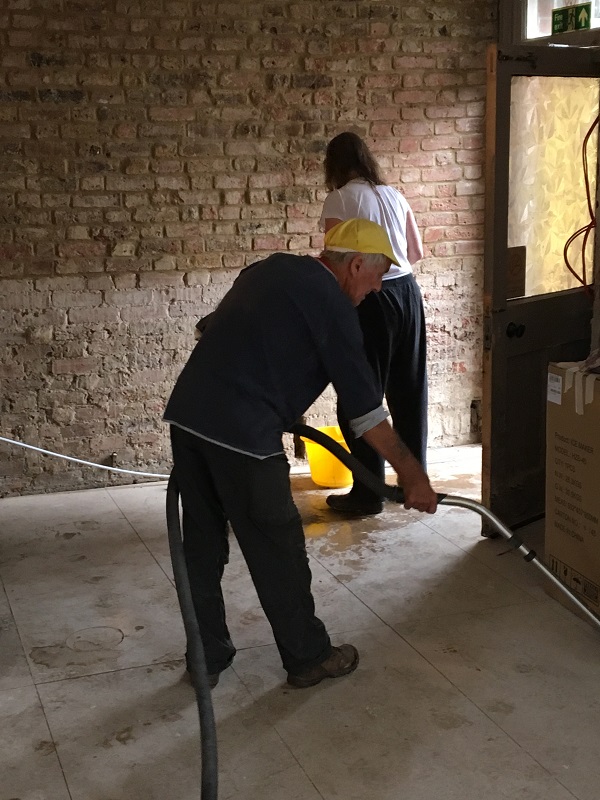 Hoovering the bar floor