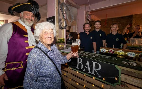 Our oldest customer with a beer