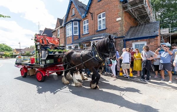 The Windsor and Eton brewery dray arriving with the ceremonial beer barrels