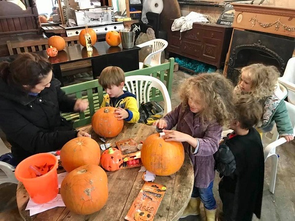 Family carving pumpkins