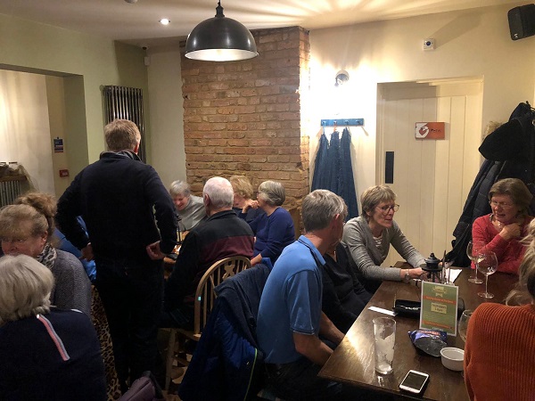 Quizzers in a packed pub