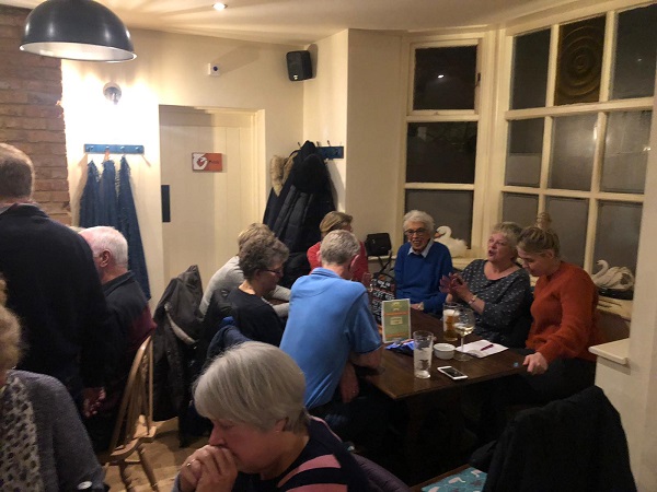 Quizzers in a packed pub