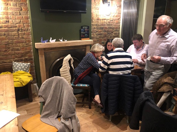 Quizzers in a packed pub