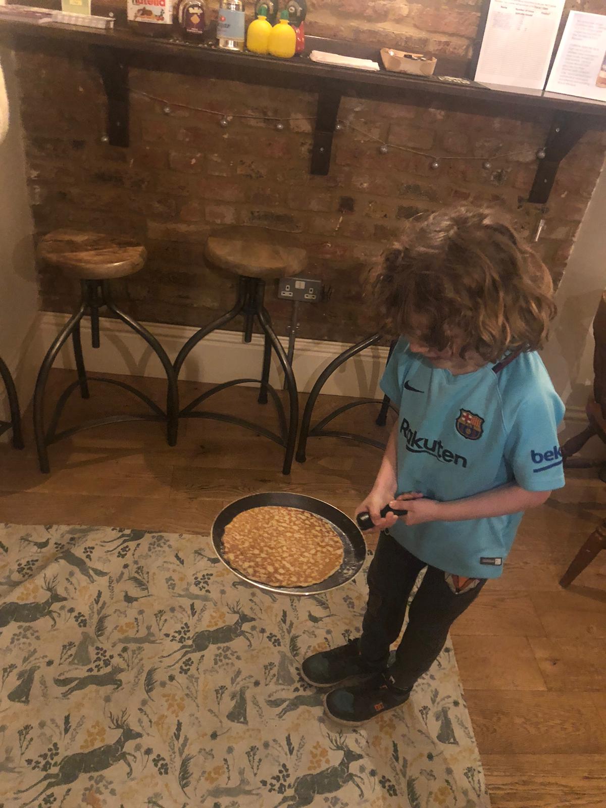 One of the competitors getting ready to flip a pancake