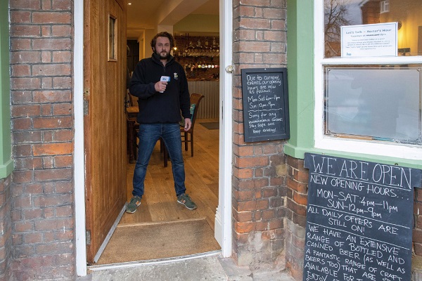 Matt at the front door with the temperature tester