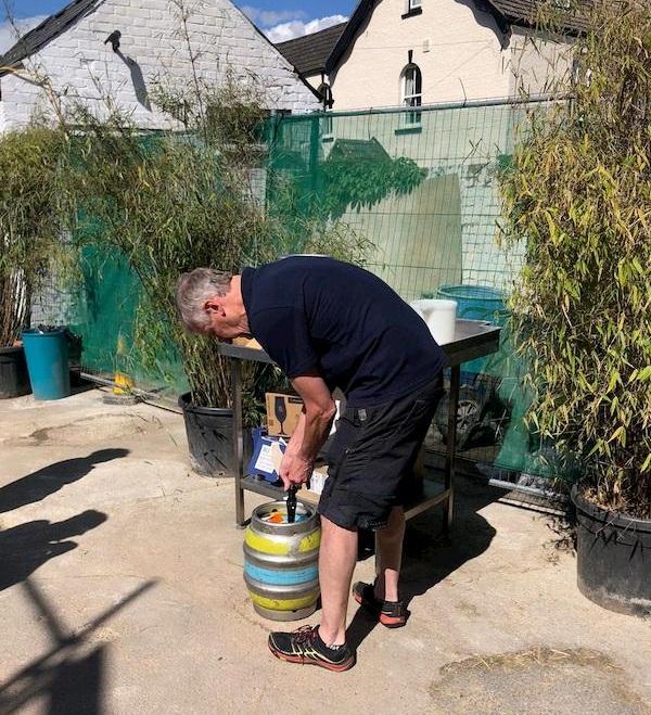 Willie preparing a cask of beer for The Bevy
