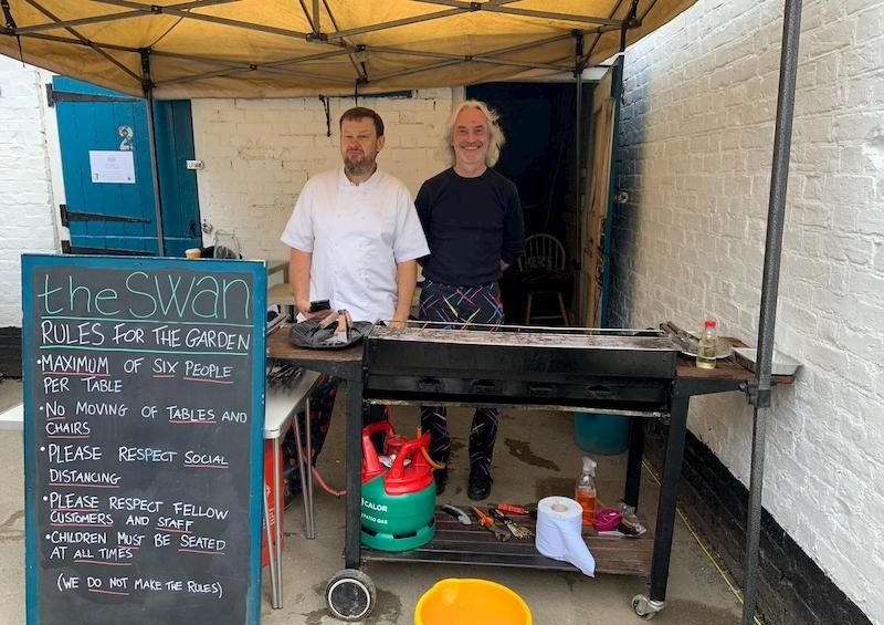 Trevor and Ian manning the BBQ as usual