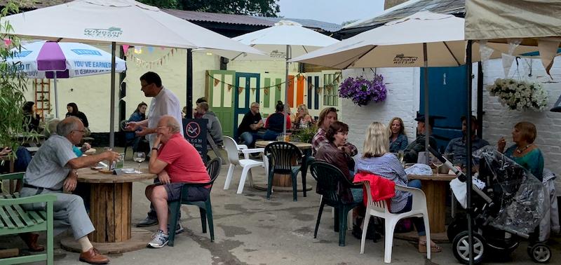 People enjoying themselves in the August evening