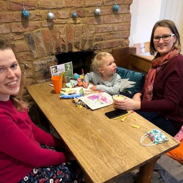 Family enjoying coffee and cake