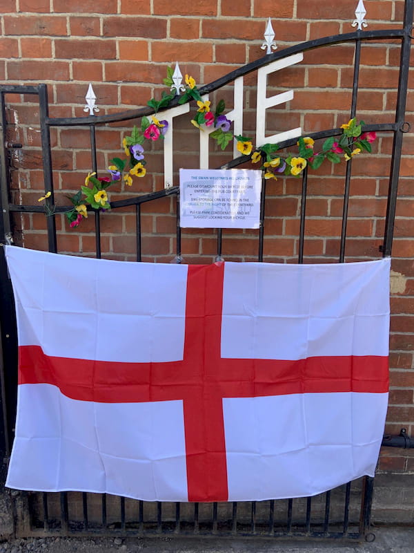 The Main Gates adorned with England flags