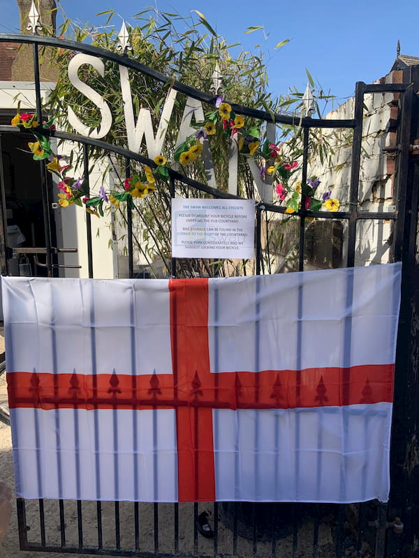 The Main Gates adorned with England flags