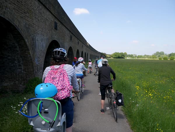 Alongside the railway arches