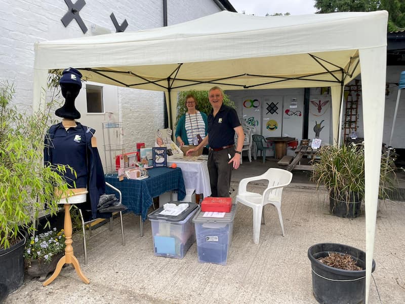 The Swan merchandise stall