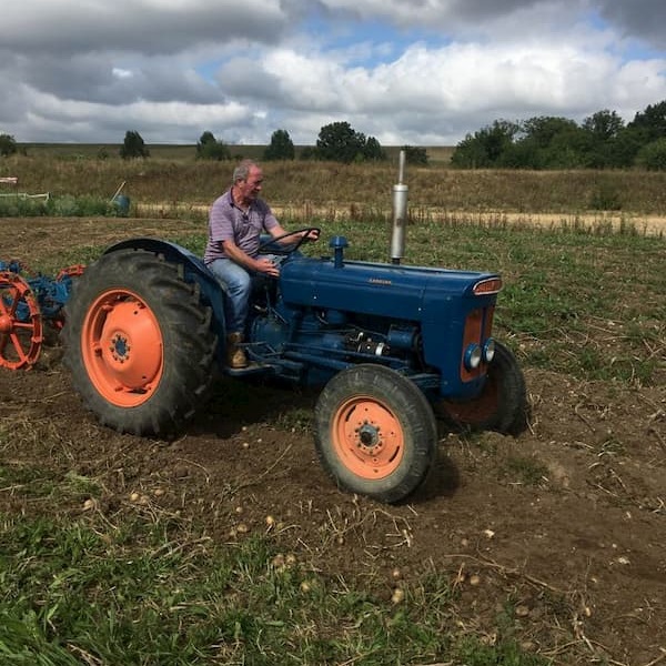 Tractor digging up the potatoes