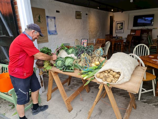 John puttin the produce table together