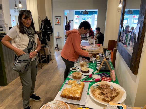 Some of the patrons deciding which cake to have