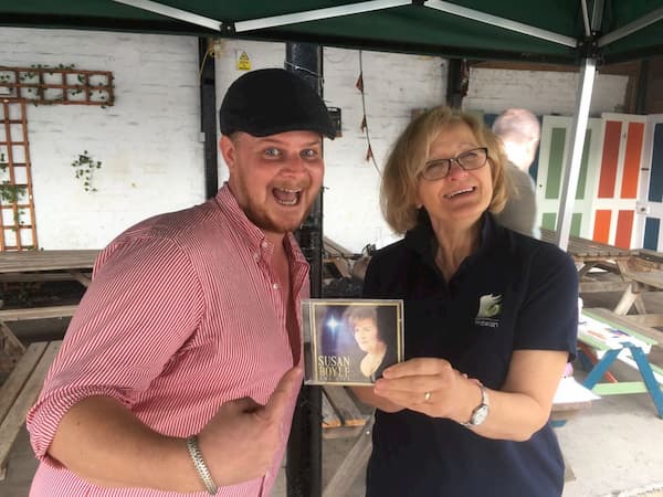 Micky and Dawn with a music classic CD - well, Susan Boyle