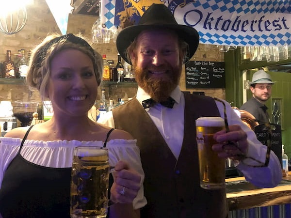 Mark & Sherridan in traditional gear and beer steins