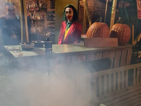 The Joker coming out of the smoke
