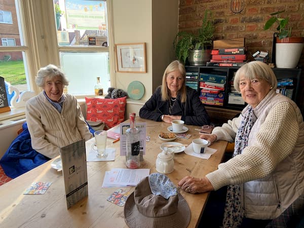 Ladies enjoying the cake