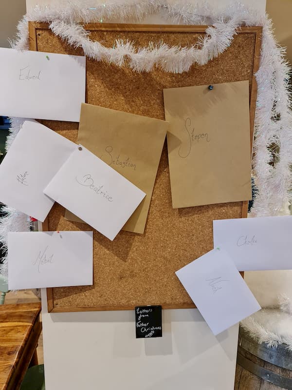 Santa next to his postbox for children
