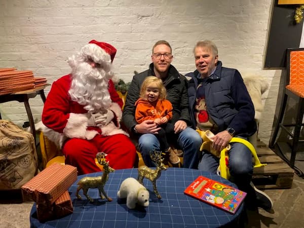 Santa with three generations of a family