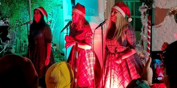 The girls dressed up and singing