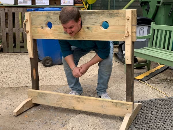 Micky trying out the stocks