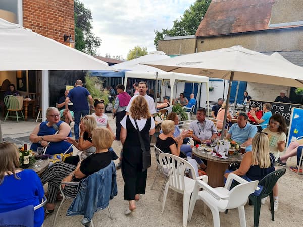 Not an emptry table in The COurtyard in the afternoon