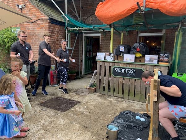 The bar staff throwing sponges at the same time