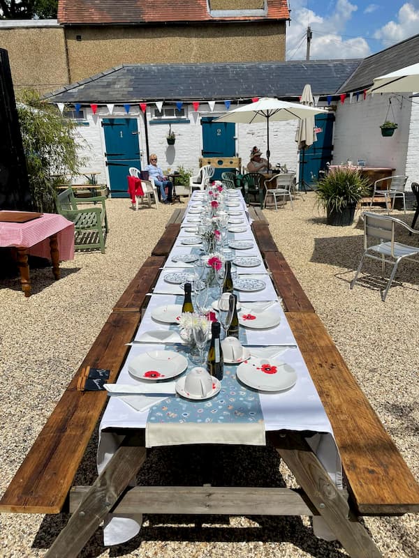 Long table all set out in The Courtyard