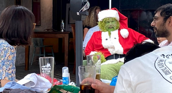 The Grinch deep in conversation with some of the locals