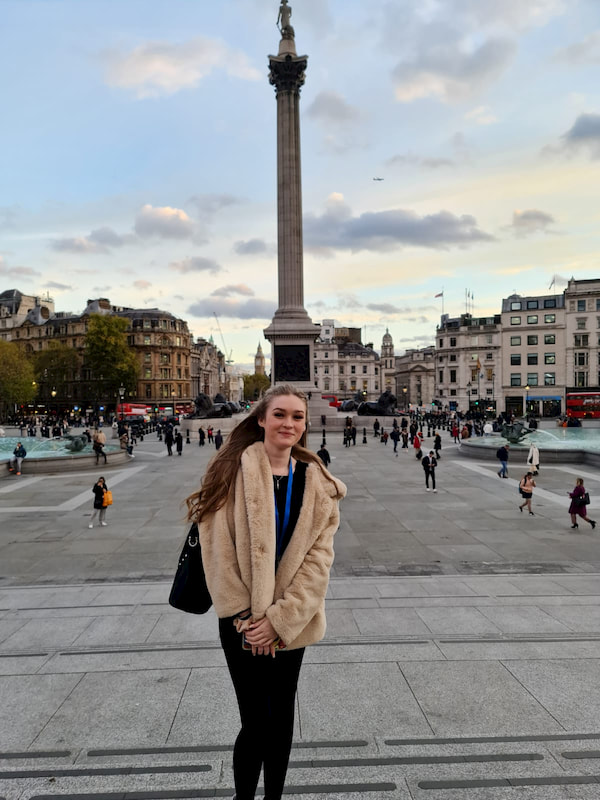 Carly in front of Nelson's Column.