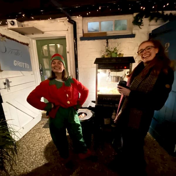 Elf and helper at Santa's Grotto
