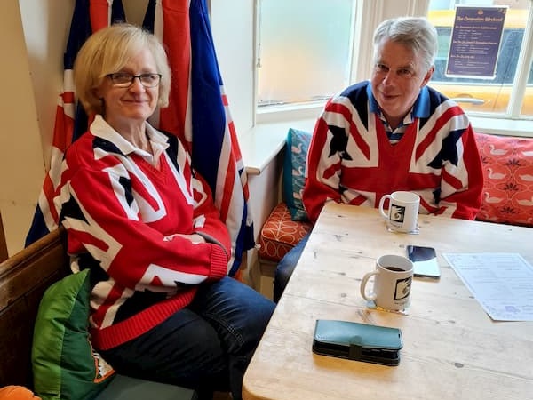 Two supporters in Union Jack jerseys.