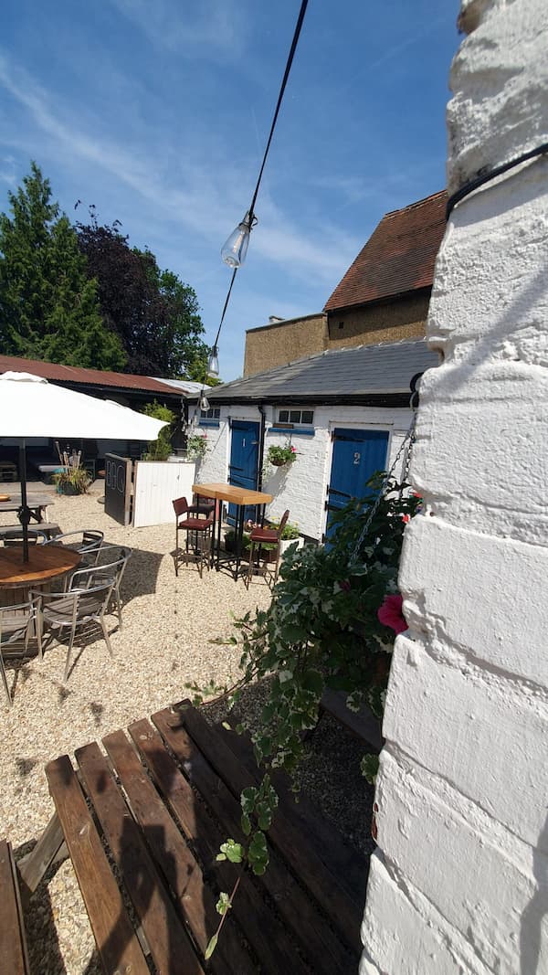 A peek at The Courtyard with hanging baskets strategically placed