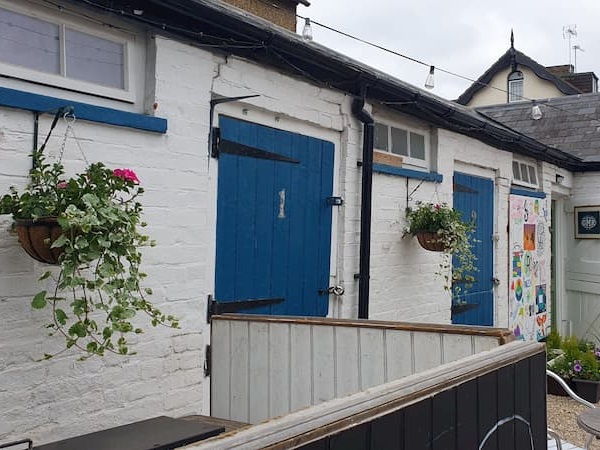 Hanging baskets on The Stables